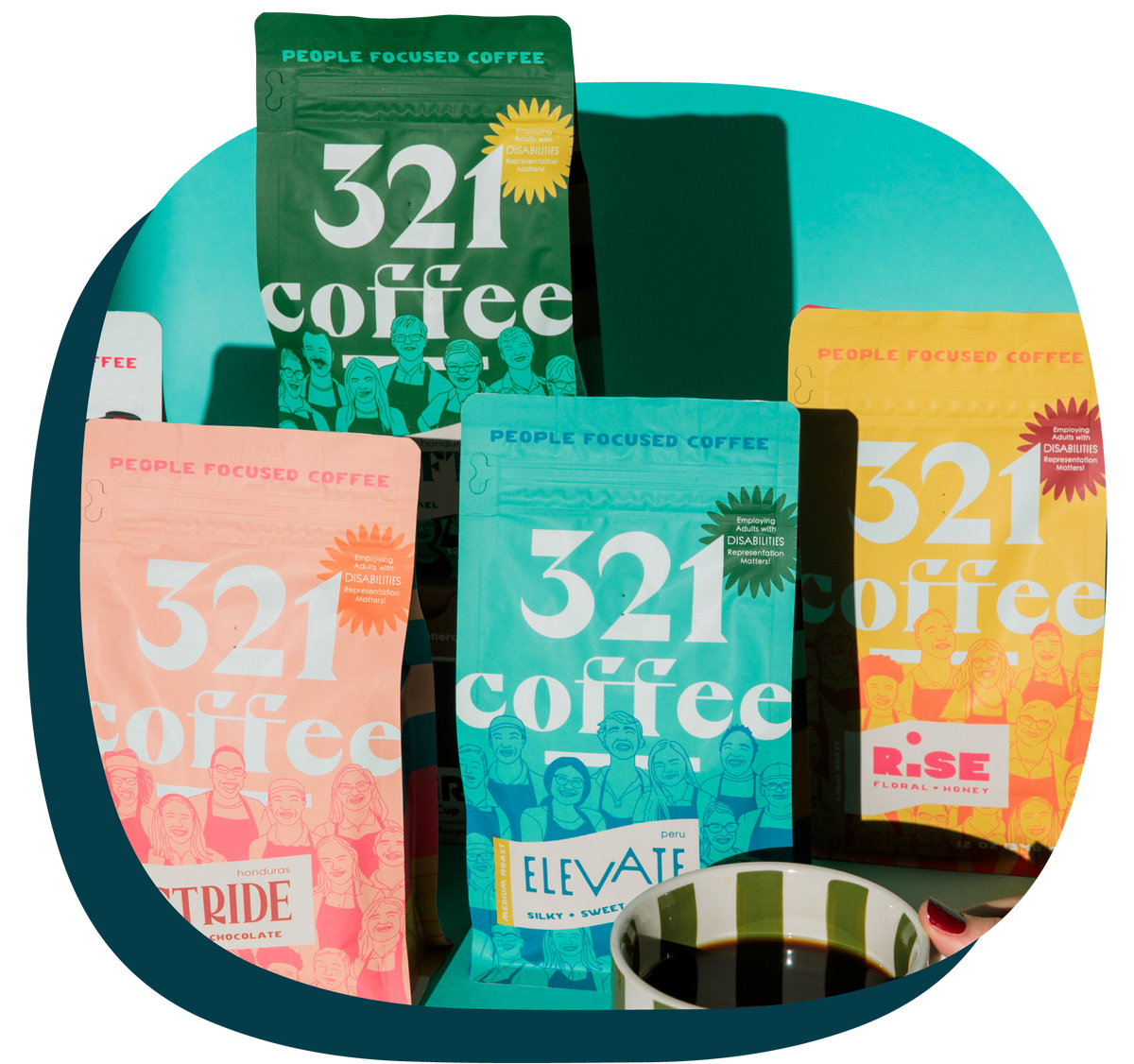 Four vibrant and colorful bags of 321 Coffee are arranged at various heights on a teal background, next to a green and white striped mug of hot coffee.