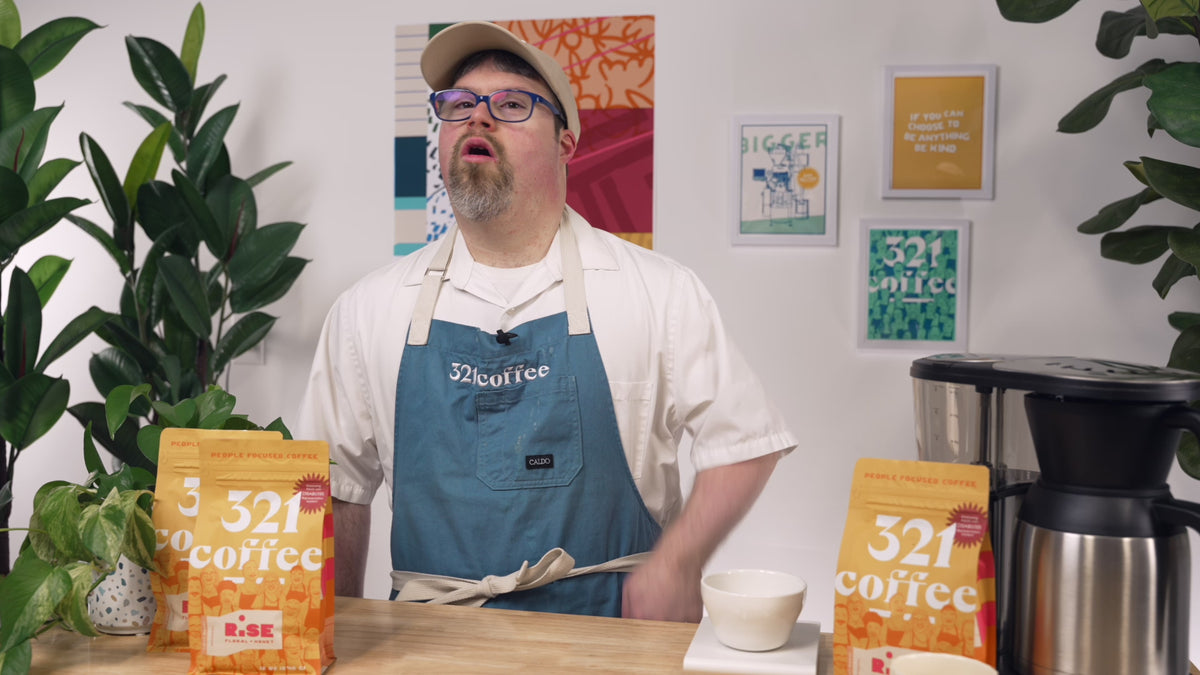 Paul, a321 Coffee barista introduces the auto drip brew guide and says, "Oh hey! I'm Paul K, and today we're making drip coffee."